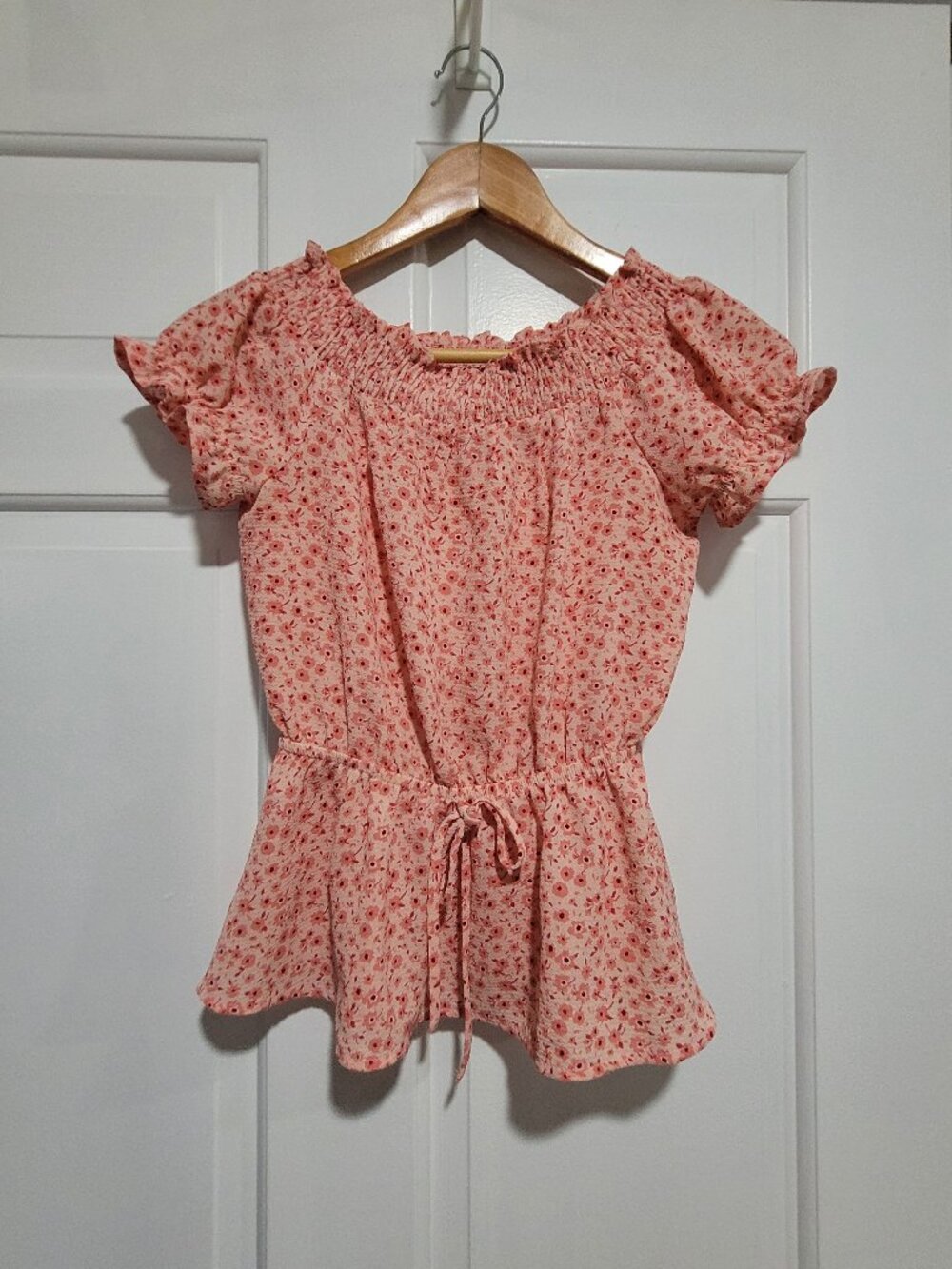 pink flowered blouse